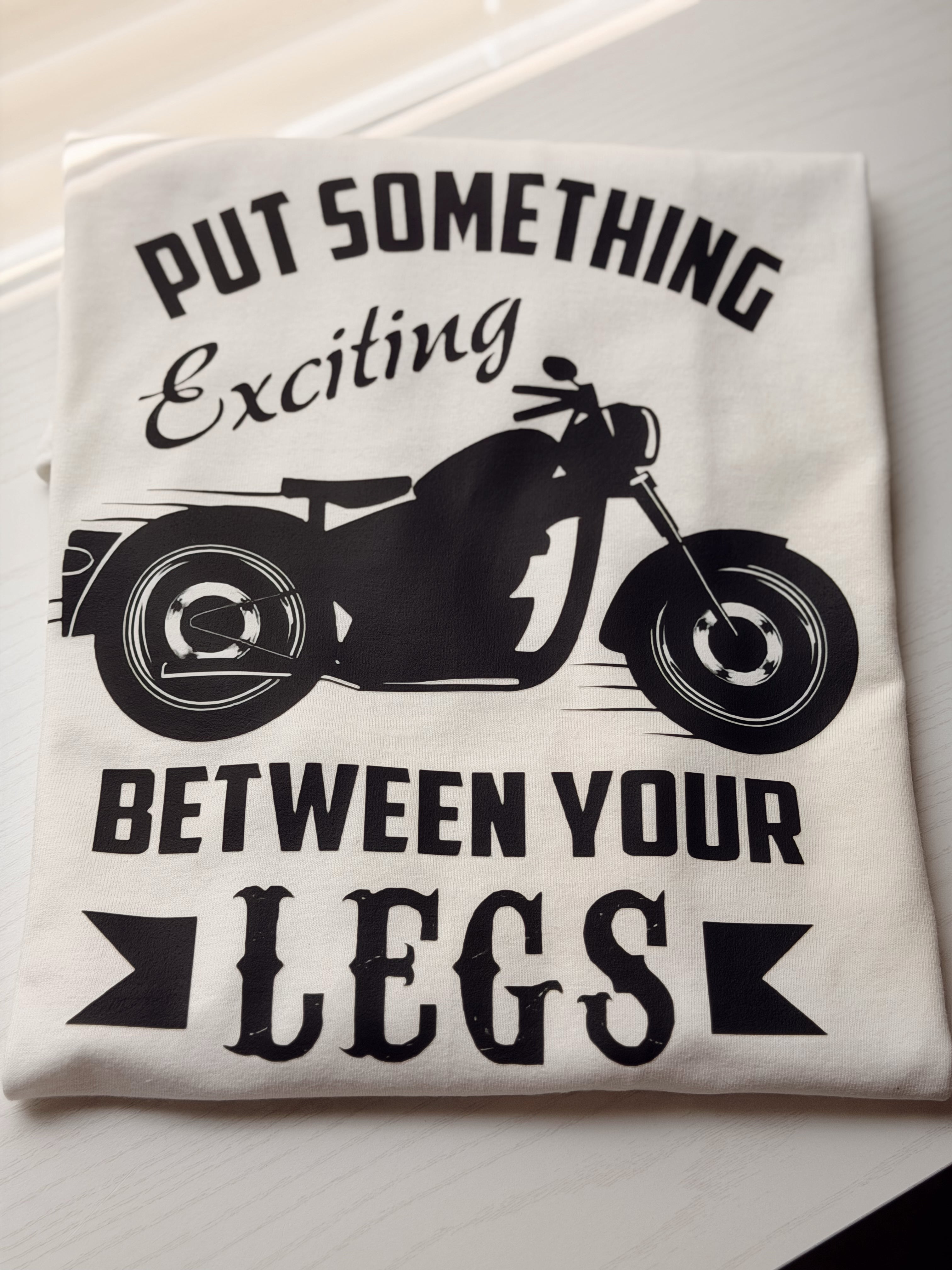 Put Something Exciting Between Your Legs Motorcycle Tee