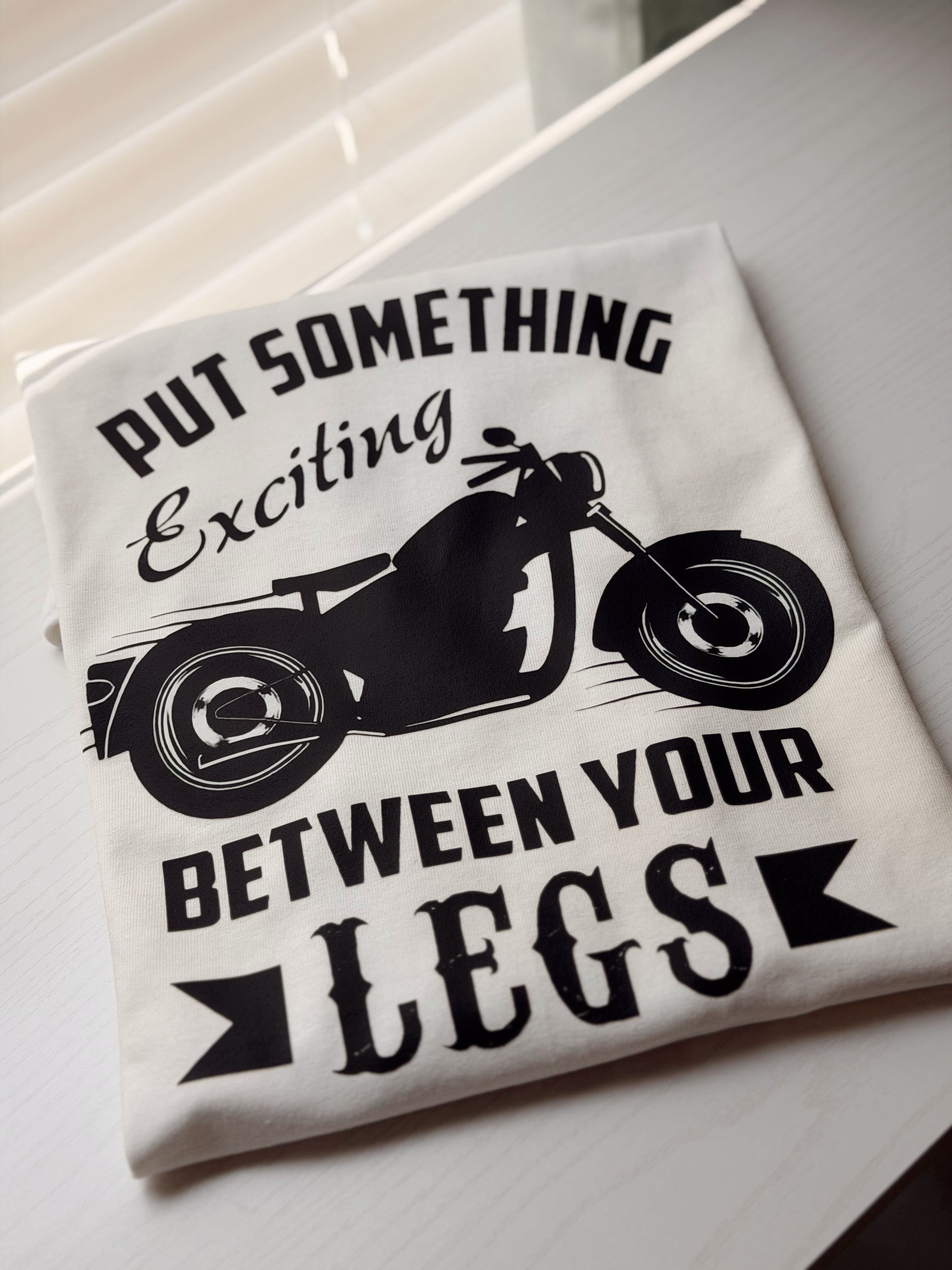 Put Something Exciting Between Your Legs Motorcycle Tee